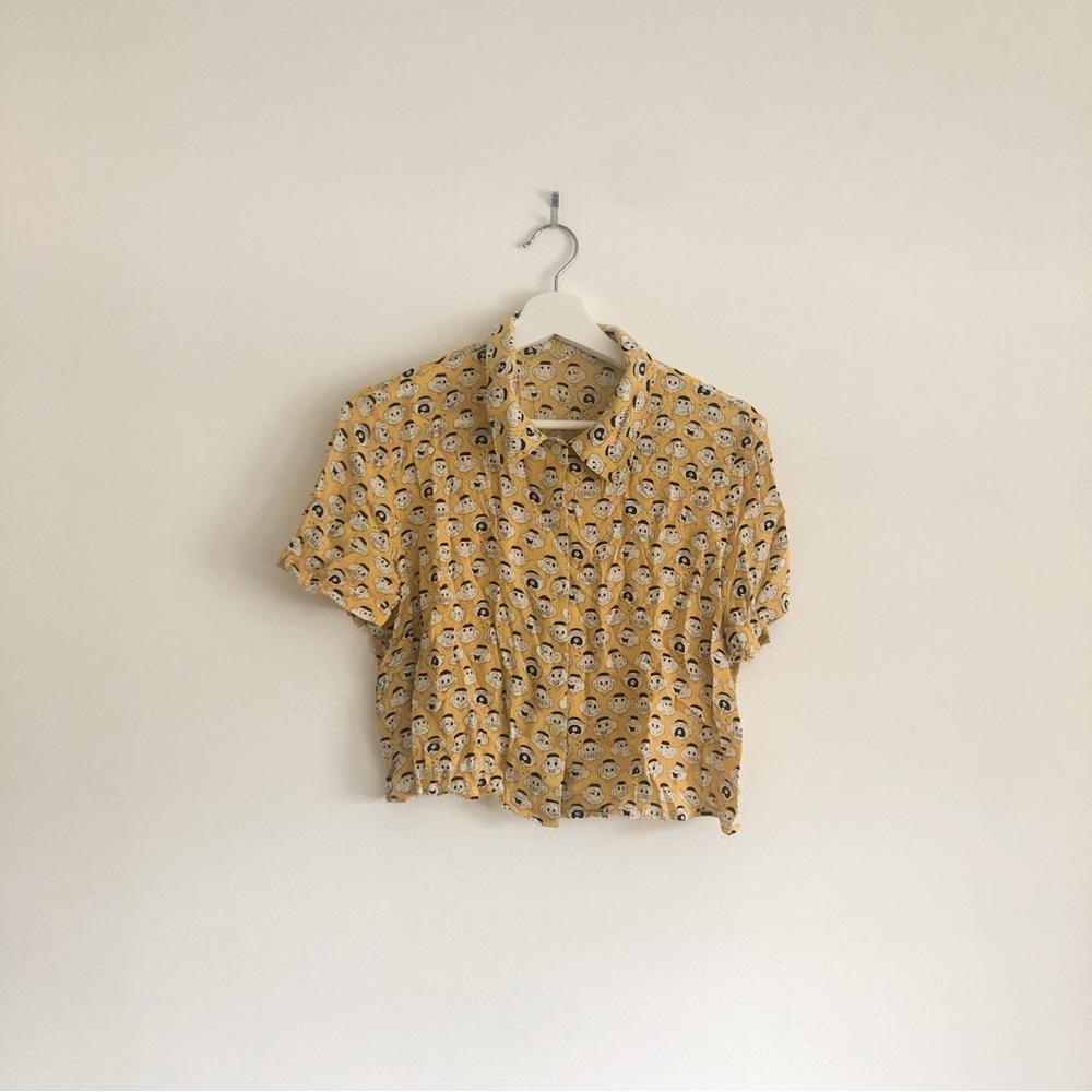 Reworked baby cartoon faces graphic crop shirt